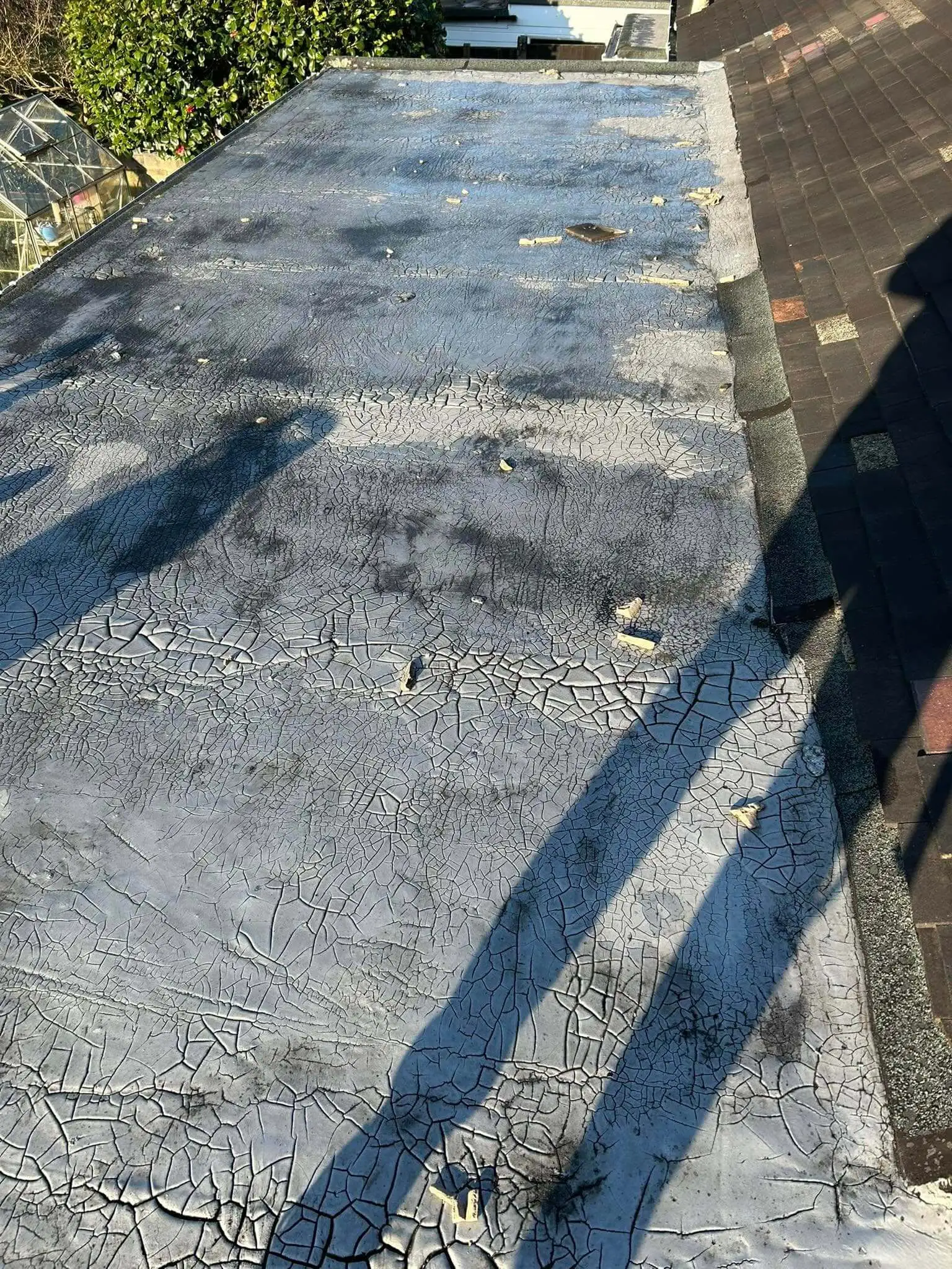 Before: Roofing project showing old roof